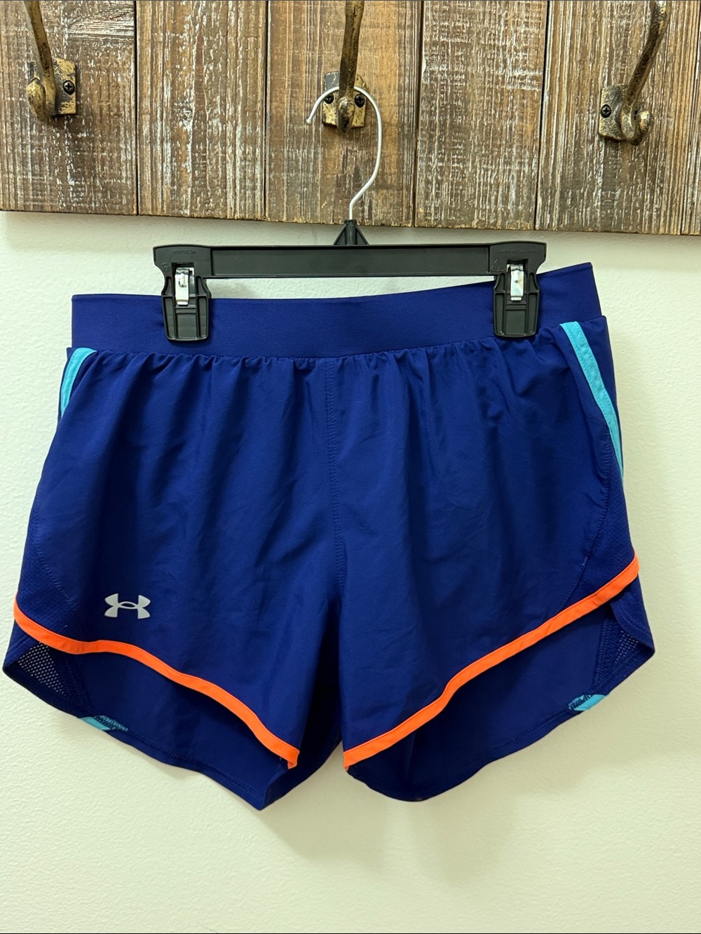 Under Armour Women’s Royal Blue Athletic Shorts with Orange Trim